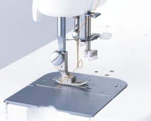 Juki TL-2300 automatische naaldinrijger